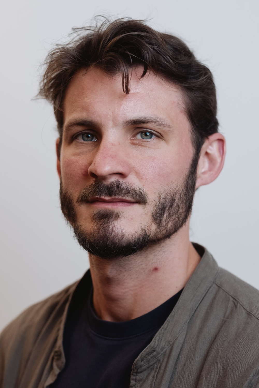 Relaxed corporate headshot, natural light look, London