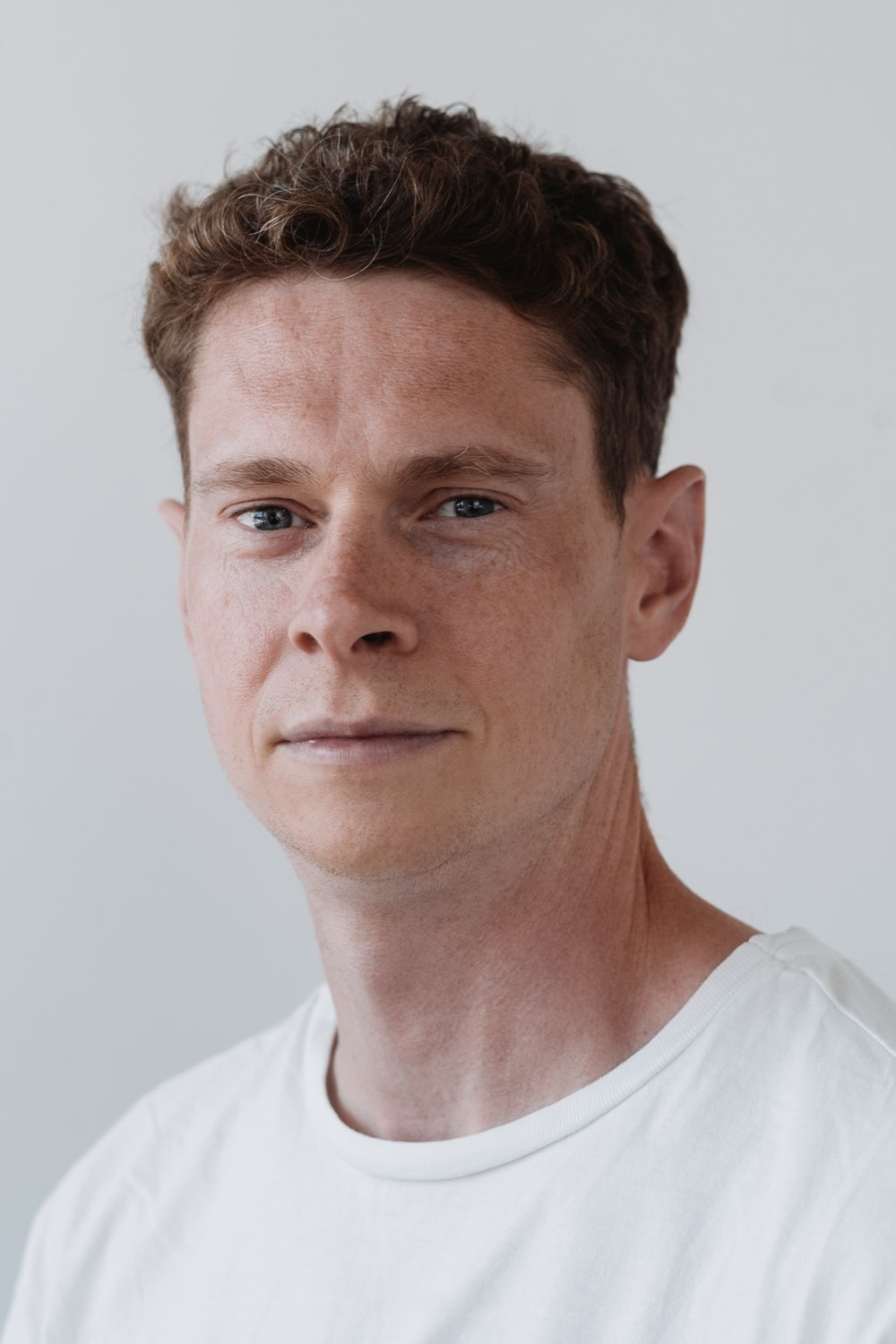 Corporate headshot session — natural light look, London office